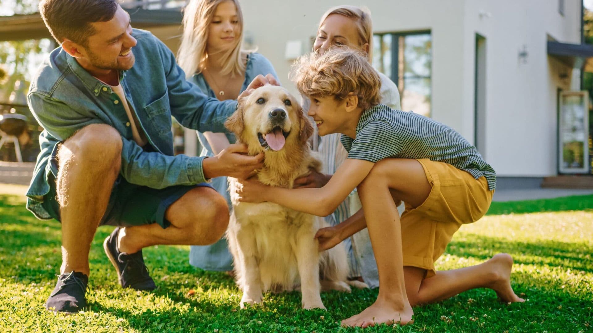 Happy Family in Front of Home